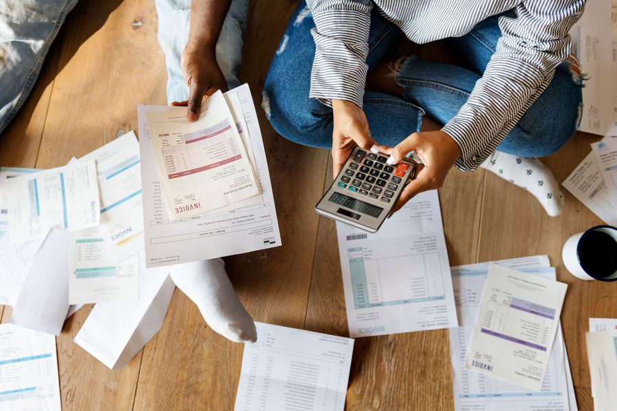 couple figuring out how to get out of debt quickly